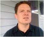 A person in a black shirt

Description automatically generated